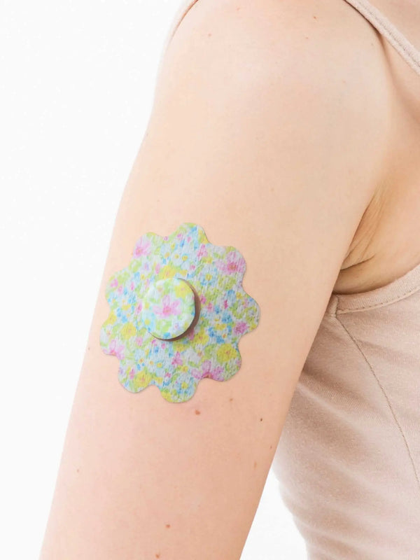 Freestyle Libre 3 flower patch worn on arm breathable adhesive CGM patch designed for comfort and secure sensor hold