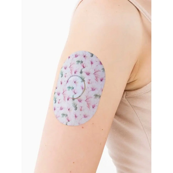 Dexcom G7 adhesive patch with spring design on arm for secure sensor protection.