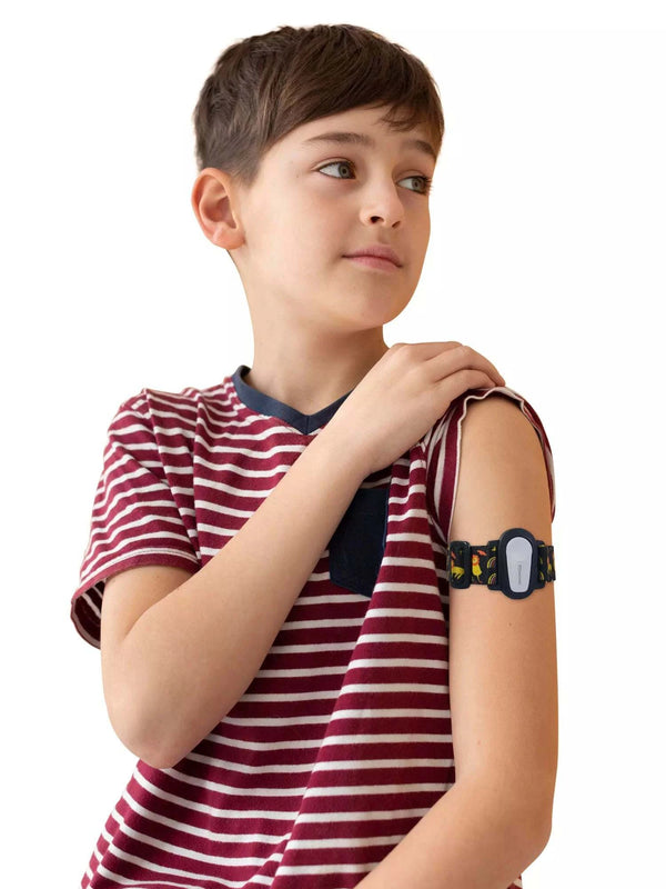 Child wearing Dexcom G6 adjustable armband with playful design.