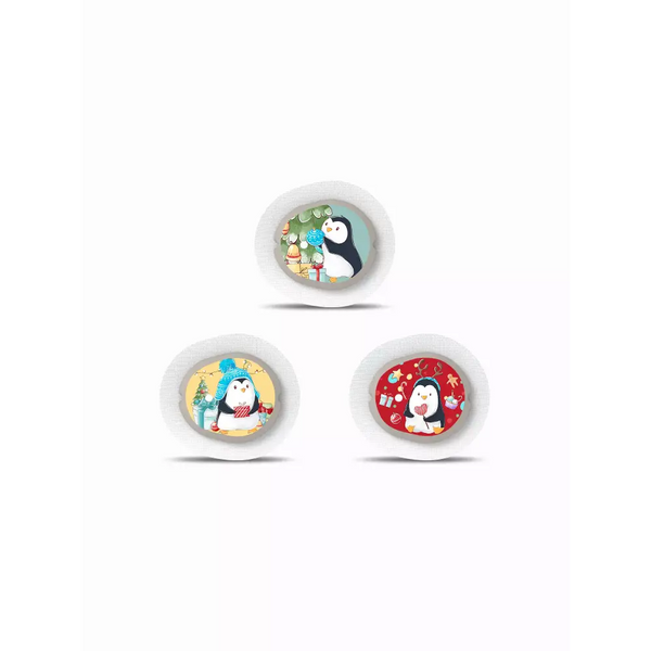 Christmas Edition Dexcom G7 CGM sensor stickers with festive penguin designs, set of three.
