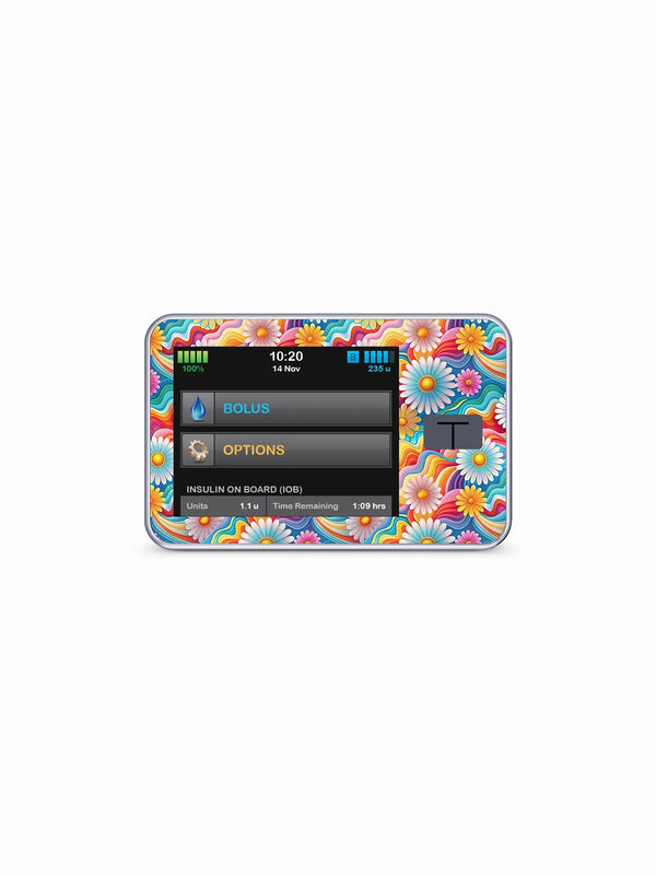 Tandem T slim insulin pump with vibrant summer edition sticker featuring sunlit patterns and beach vibes.