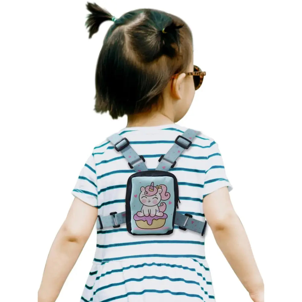 Toddler seen from the back wearing an insulin pump harness Image