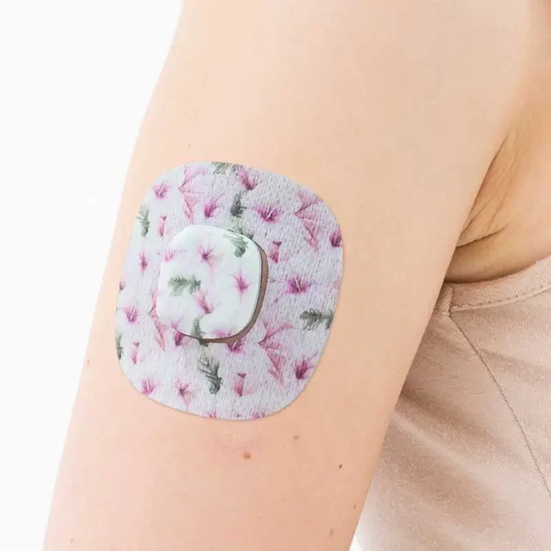 simplera sensor patch with sticker on the arm Image