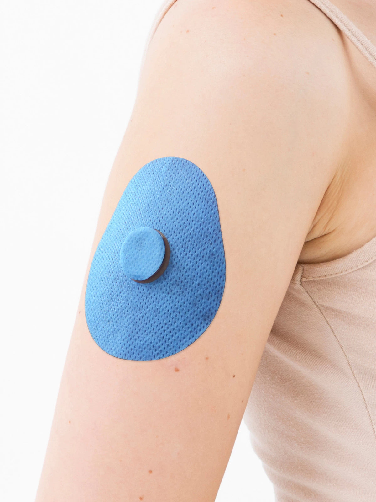 Adesivo de fixação para FreeStyle Libre 3, forma de gota, no braço, grande plano
