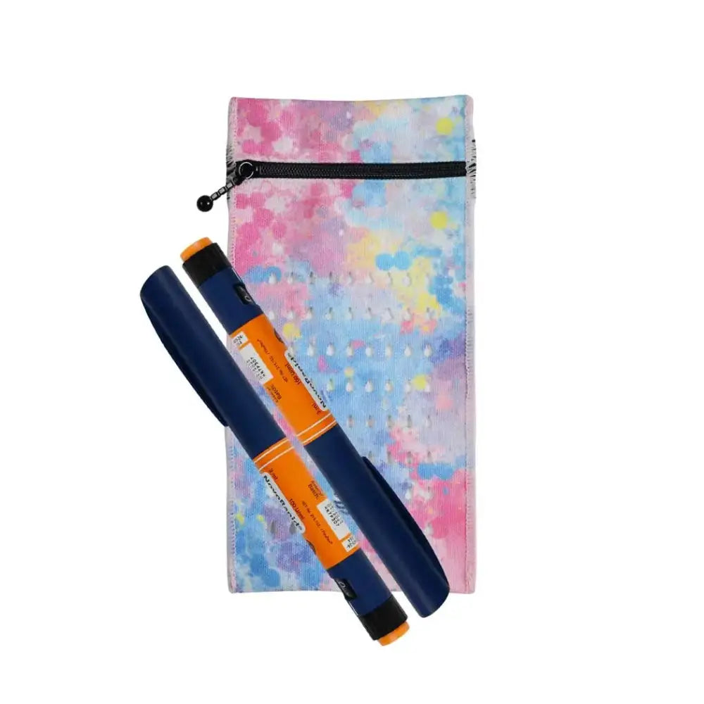 Insulin cooling wallet in tie-dye design with two insulin pens.