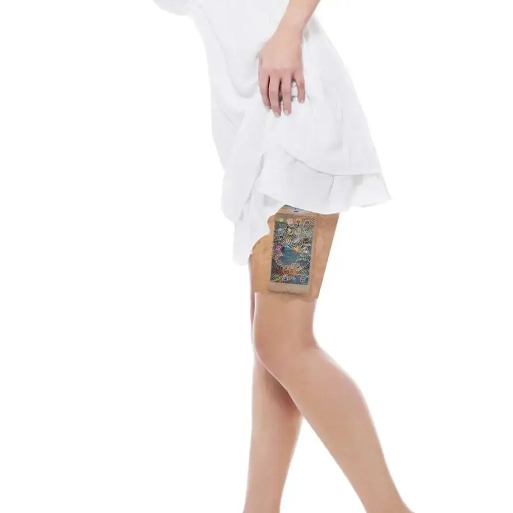 Lace garter leg band securing an insulin pump under a white dress