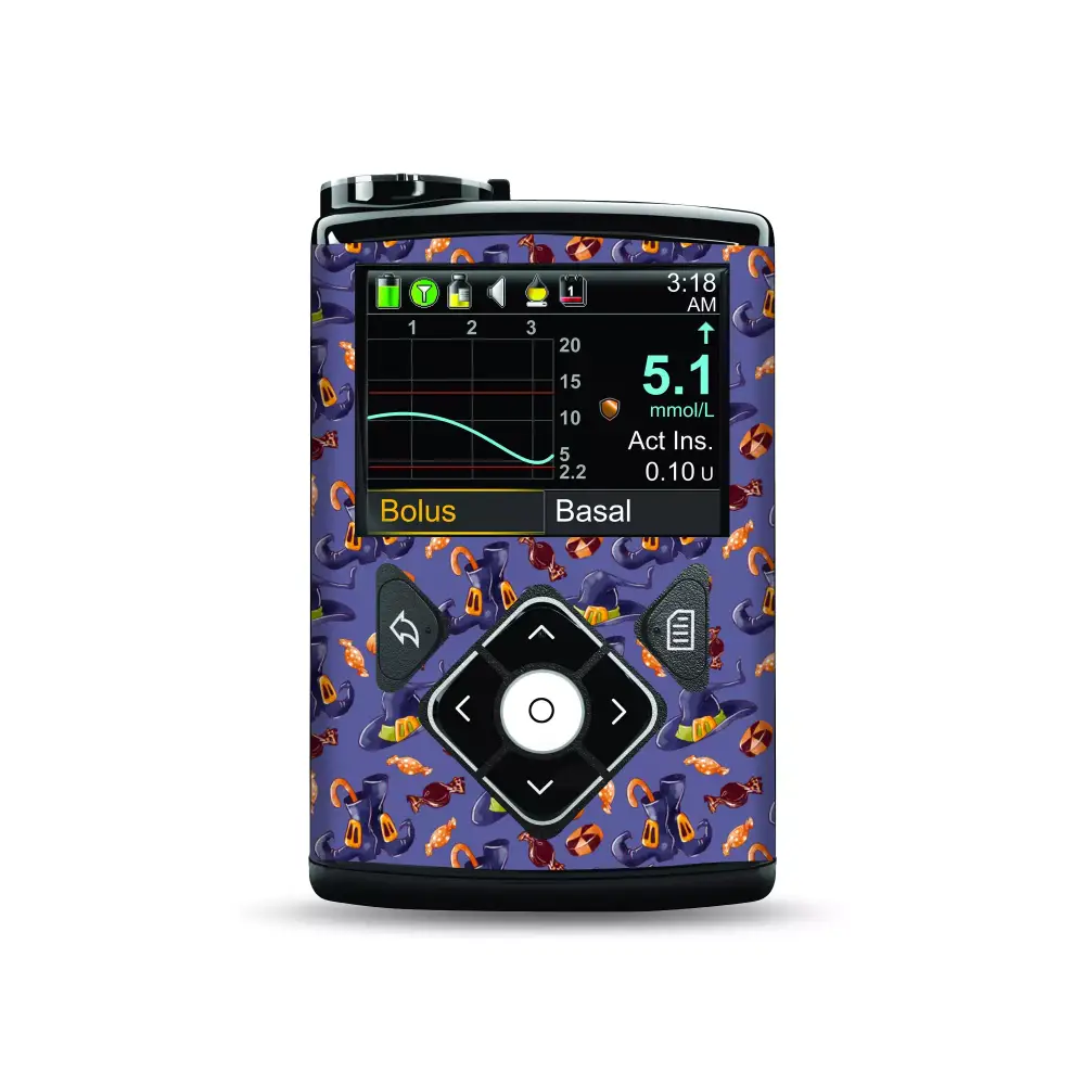 Medtronic MiniMed Insulin Pump with Halloween Edition Stickers featuring pumpkins and bats.
