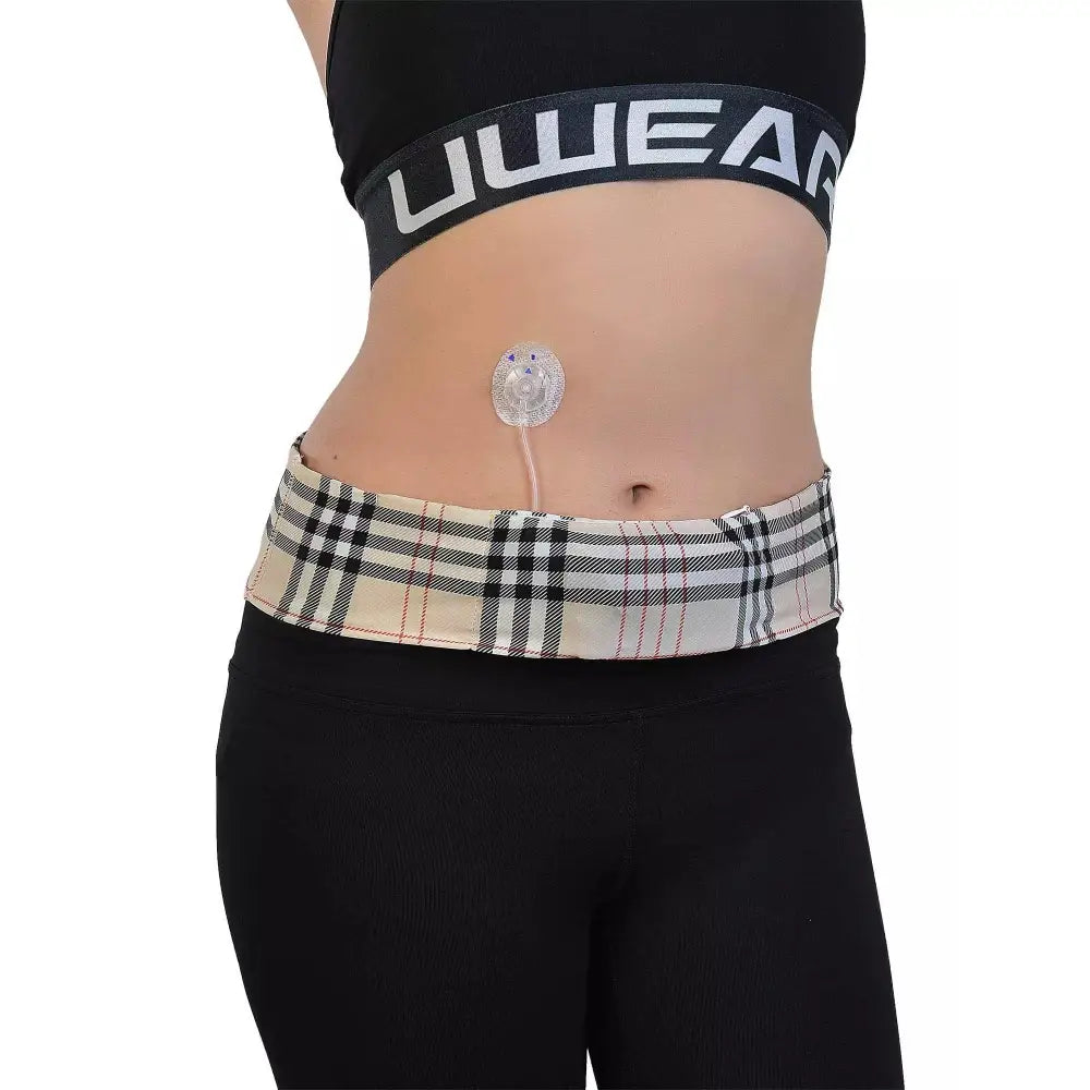 Insulin pump waist belt with stylish print, worn by a person, providing secure and discreet support.