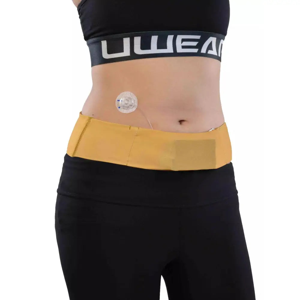 Insulin pump waist belt in solid color worn on waist, designed for comfort and functionality with infusion tube openings.
