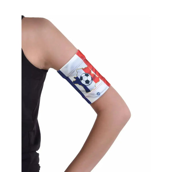 Glucose sensor armband for children with flag design, ideal for sports activities.