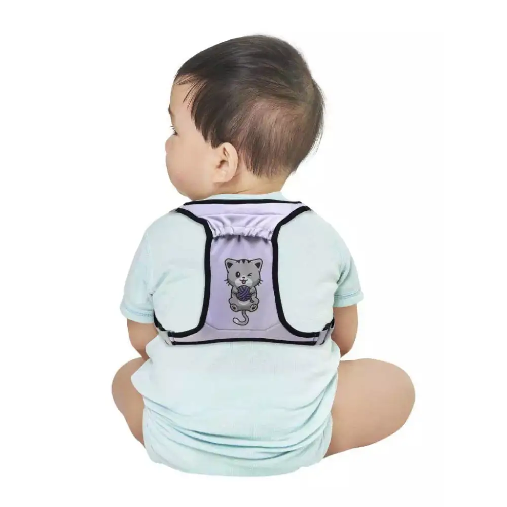 Child wearing Dia-Harness insulin pump harness with cartoon design, showcasing comfortable and secure wear for kids.