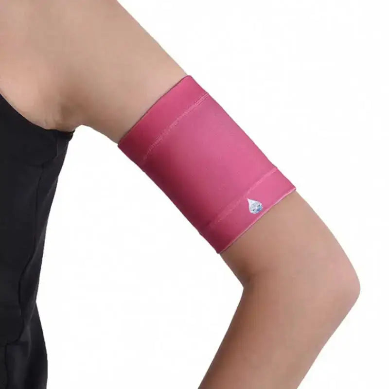 Protective armband for glucose sensors, pink, comfortable fit for diabetes management.