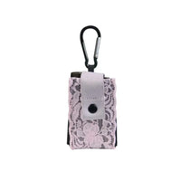 Lace insulin pump pouch with carabiner for secure attachment.